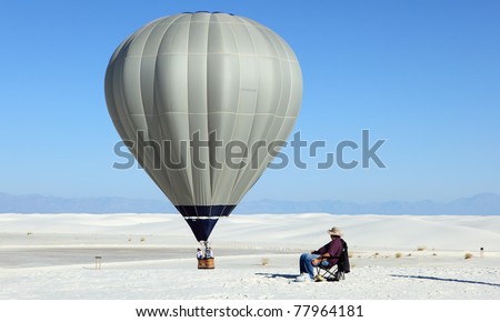 Hot air balloon and white sand dune  at White Sands National Monument, New Mexico, USA