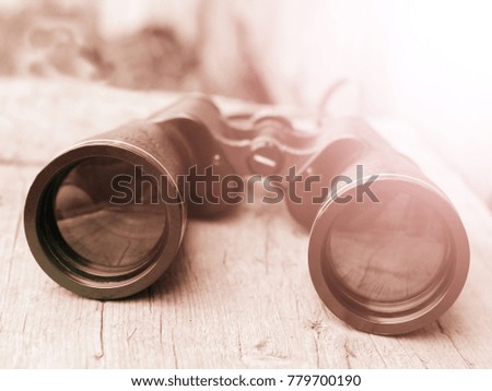 Big binoculars, beautiful reflection in glasses, object