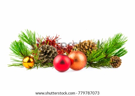 Christmas decoration red golden yellow balls with fir cones and fir tree branches isolated on a white background. New Year holiday evergreen tree, Xmas green art corner design