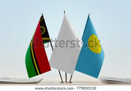 Flags of Vanuatu and Palau with a white flag in the middle