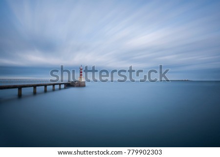 Amble Pier in Northumberland. Royalty-Free Stock Photo #779902303