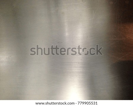 Background of stainless steel with dark light