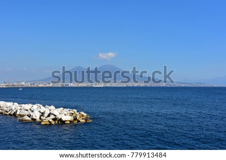 Italy, Naples, cliff of Via Caracciolo and Vesuvius in the background. Royalty-Free Stock Photo #779913484