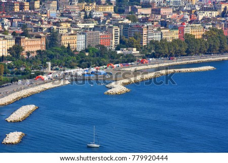 Italy, Naples, view of the seafront of Via Caracciolo. Royalty-Free Stock Photo #779920444
