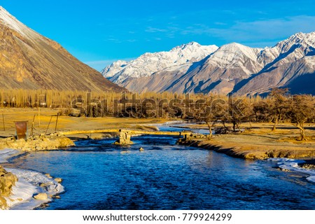 Snow mountains, free flowing river & fresh air is you need to live the rest of your life in peace, Ladakh, India. Natural beauty of Ladakh in India. Famous tourist place in the world. Travel - Image Royalty-Free Stock Photo #779924299