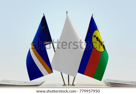 Flags of Marshall Islands and New Caledonia with a white flag in the middle