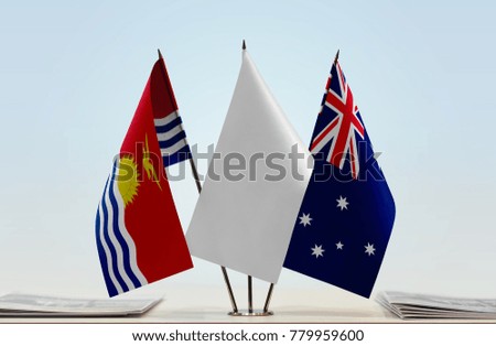 Flags of Kiribati and Australia with a white flag in the middle