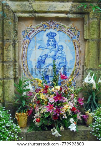 Courtyard Garden Flowers at Carmel Mission Basilica, California Royalty-Free Stock Photo #779993800