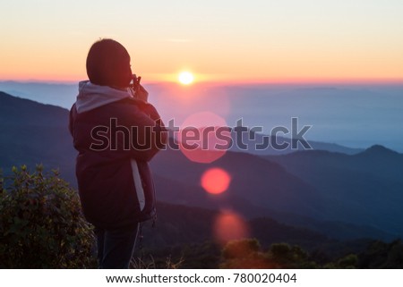 Take a picture of the sunrise in the morning at the mountain. Sunlight in the morning very beautiful and refreshing.