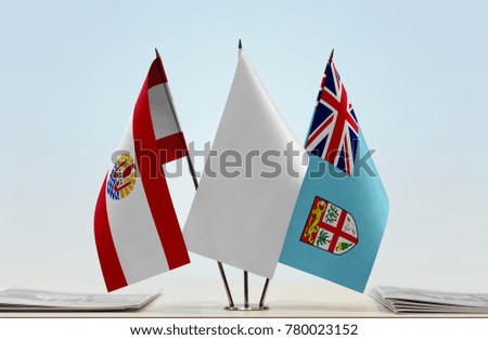 Flags of French Polynesia and Fiji with a white flag in the middle