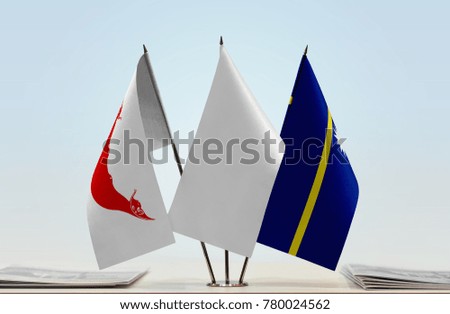 Flags of Easter Island and Nauru with a white flag in the middle