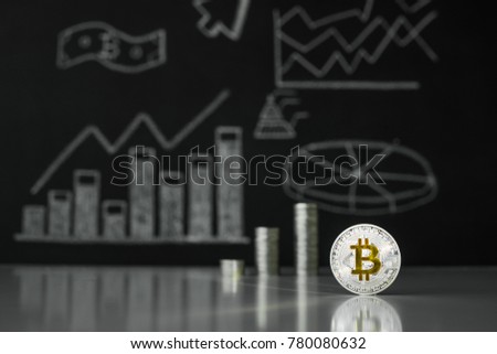Silver stacks of coins bitcoin on a dark background. Virtual currency of new time