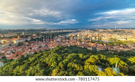 Wonderful timelapse View To The City Of Prague From Petrin Observation Tower In Czech Republic. Blue cloudy sky before sunset
