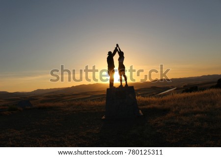 Couple sharing a love sunset 