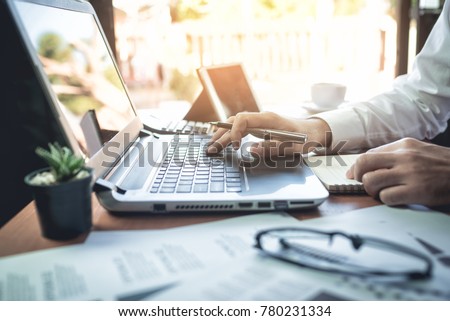 Businessman working on Desk office business Royalty-Free Stock Photo #780231334