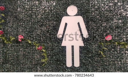 Female toilet symbol.