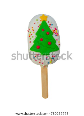 Christmas candies and ice cream decorated as Christmas trees on white background. New year and Christmas composition