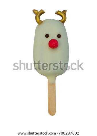 Christmas candies and ice cream decorated as reindeer on white background. New year and Christmas composition