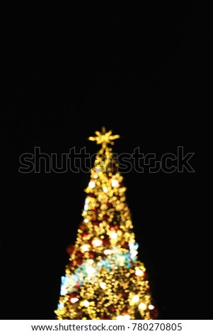 Colorful light Abstract bokeh background and blurred of Christmas tree decorations and celebrations display in the night.Christmas and holiday Concept.