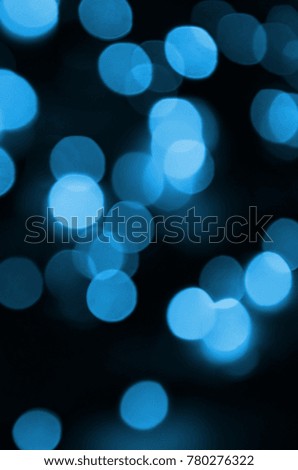Blue Festive Christmas elegant abstract background with many bokeh lights. Defocused artistic image