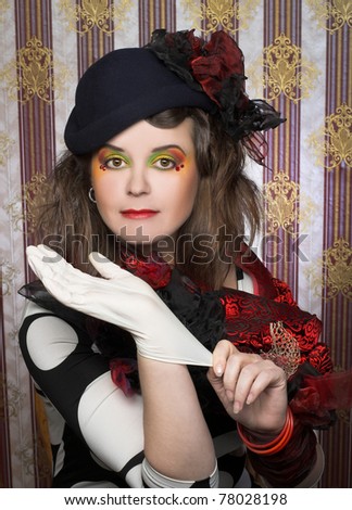 Charming lady in creative image and with ribbon glove