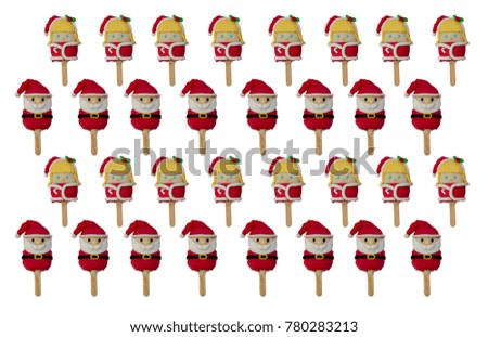 pattern of Christmas candies and ice cream decorated as santa claus and girls on white background. New year and Christmas composition