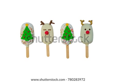 group of Christmas candies and ice cream decorated as santa claus, Christmas tree, girl and reindeer on white background. New year and Christmas composition