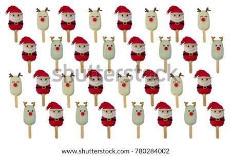 pattern of Christmas candies and ice cream decorated as santa claus and reindeer on white background. New year and Christmas composition
