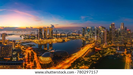 Singapore city with office building, hotel and harbor in morning sunrise time. Singapore city  Royalty-Free Stock Photo #780297157