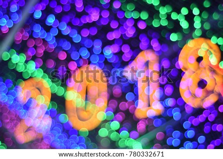 Abstract blurred of Happy New Year 2018  with colorful bokeh Lights background
