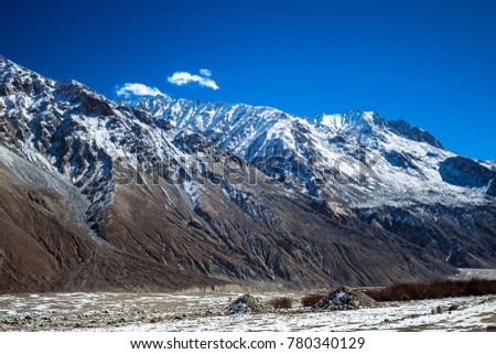 Snow mountains of Nubra Valley in Ladakh India. White snow on the blue mountains of Himalayan range. Natural beauty of Ladakh in India. Famous tourist place in the world. Travel Photography. - Image