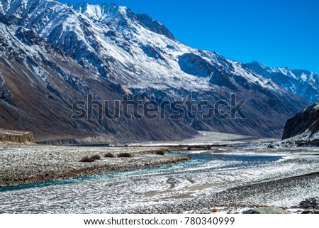 The Shyok river flowing besides the mountains of Ladakh is a mesmerising experience.