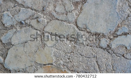 Fractured concrete surface closeup background. Old concrete floor dirty.