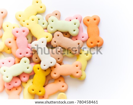 Delicious of dog biscuit , dog snack or dog  chew in copy space on the white background, Can use background , Advertising for pet food Royalty-Free Stock Photo #780458461