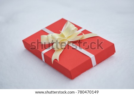 gift in a red packing on a white background.