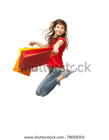 picture of jumping teenage girl with shopping bags