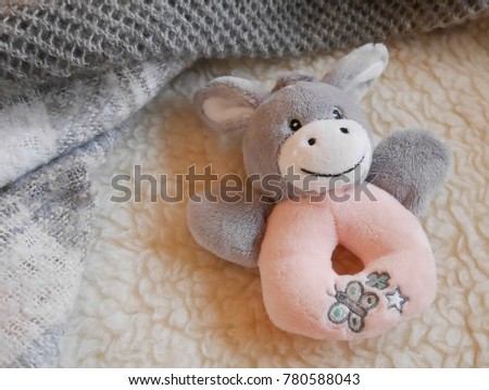 grey and pink stuffed toy animal