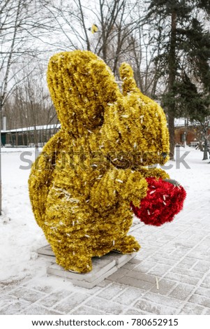 Golden squirrel in snow
