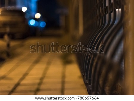 a perspective view of a Iron fences,blurry background