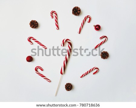 Christmas candy cane lollipop isolated on a white