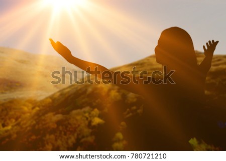 Happy woman on sunset light