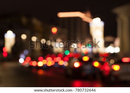 Bokeh template for design. night road with stop signals of cars.