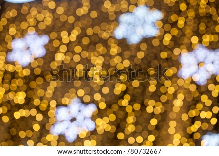 Bokeh  with  unfocus snowflakes as template for design
