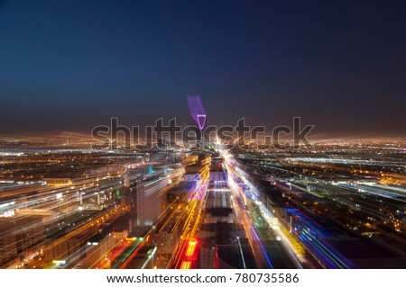 Riyadh skyline at night #6 showing Kingdom Tower, Fast Transition, Zoom In Effect Royalty-Free Stock Photo #780735586