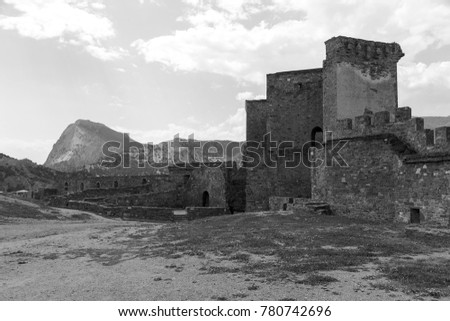 The ruins of the ancient Turkish fortress in Crimea, Sudak. The ruins of the ancient city. The fortress on the cliffs. Ruined wall of ancient medieval fortress. Remains of an ancient fortress