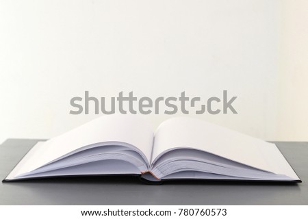 Open book on gray table