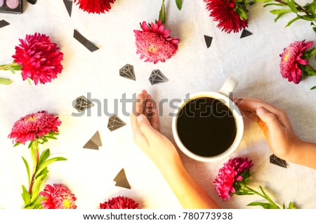 Morning coffee. spring day. flowers and diamonds. sequins. view from above. background and texture
