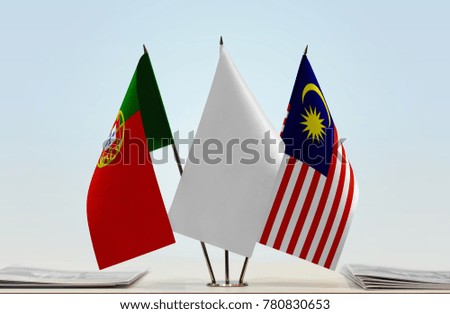 Flags of Portugal and Malaysia with a white flag in the middle