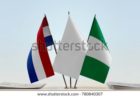 Flags of Netherlands and Nigeria with a white flag in the middle