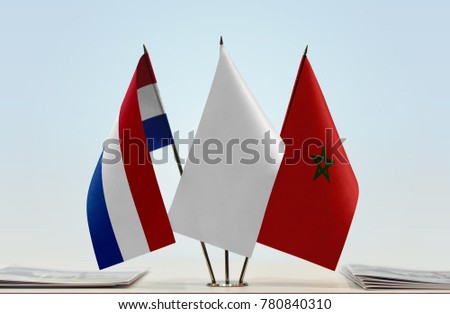 Flags of Netherlands and Morocco with a white flag in the middle